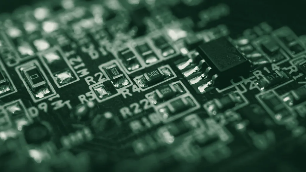Close-up of a circuit board, toned in green